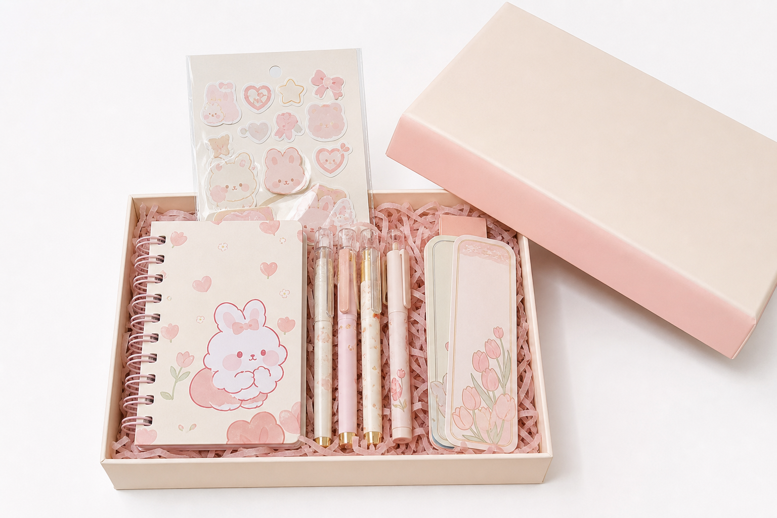 Combo quà tặng tựu trường gồm sticker Mèo Kem, sổ tay, bút gel và bookmark tông hồng kem